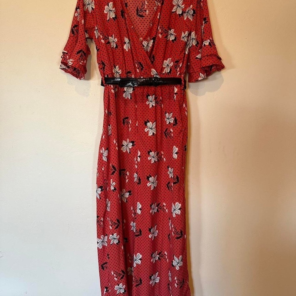 True Destiny red floral maxi jumper pant with black belt. Size L fits M. Capri
